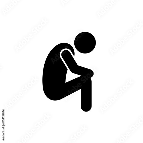 Silhouette of a person sitting and resting with head down  