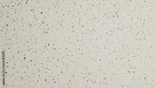 Modern terrazzo texture with neutral black grey and brown chips on a light beige background.