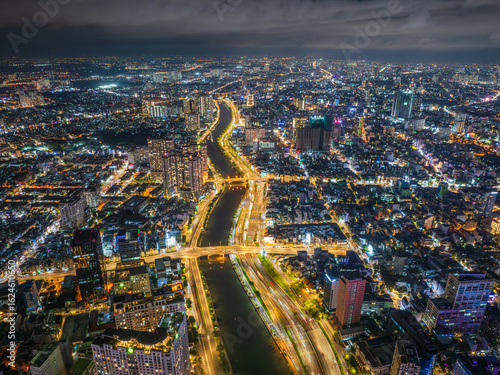 Aerial view of night light in Sai Gon, Ho Chi Minh city. Urban landscape background