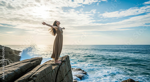 Woman Embracing Ocean Freedom on Rocky Coast