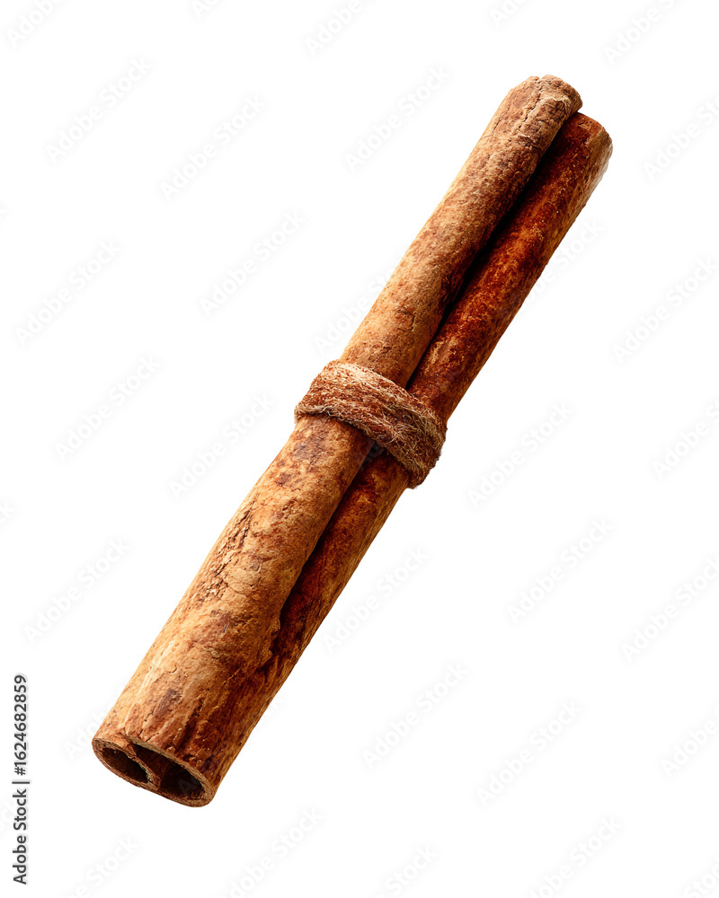 Two Cinnamon Sticks Tied Together on Black Background Two Cinnamon Sticks Tied Together on Black Background