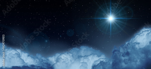 Wallpaper Mural Glowing star in the night starry cloudy sky. Symbol of Christmas and New Year. Torontodigital.ca