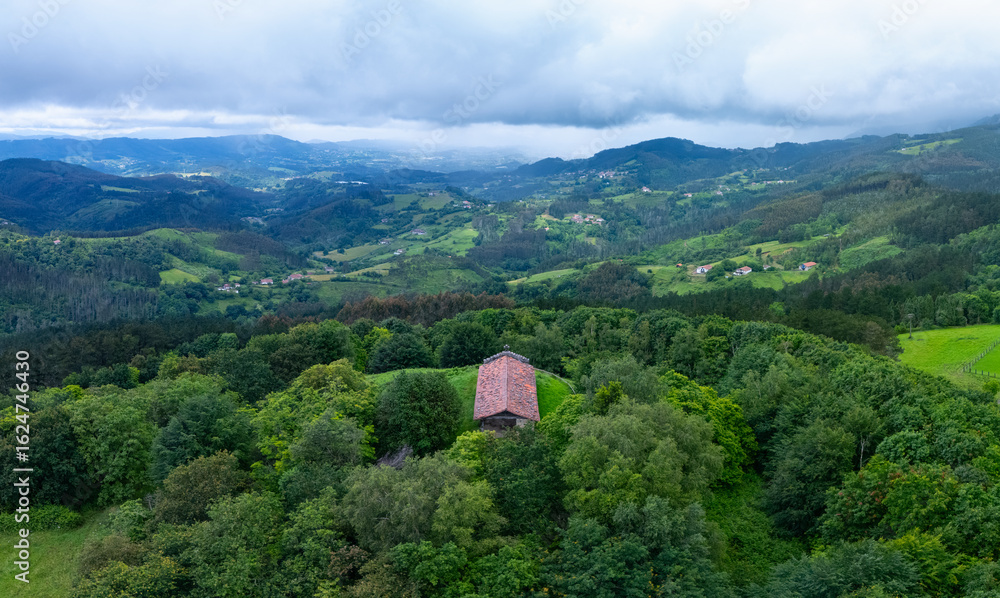 Obraz premium Aerial view from a drone of the Santa Gurutze hermitage in Biscay in the province of Bizkaia in the autonomous community of the Basque Country. Spain. Europe