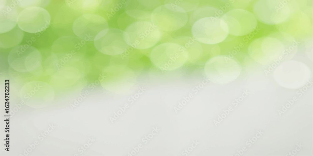 Obraz premium Green abstract bokeh background with soft bright light and blurred nature-inspired design pattern