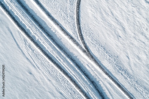 Aerial view of tire tracks in snow
