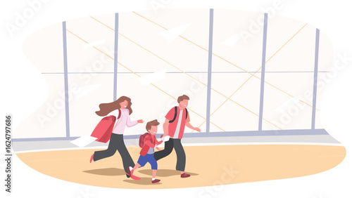 Family with a child running in an airport terminal with large windows and carrying bags together quickly