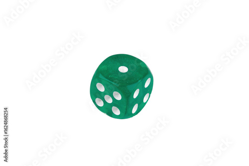 Close-up of a single genuine used green colored semi-transparent dice