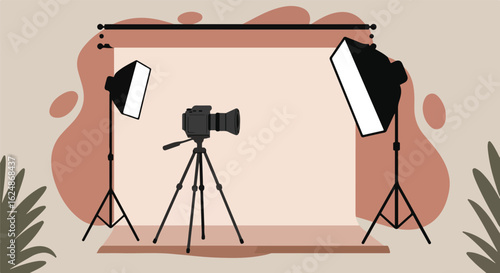 Camera on tripod, softbox lighting set in studio background, for professional use