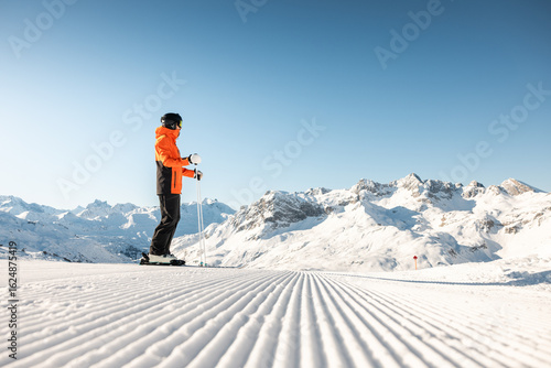 Skier on Sunny Slope in Lech Zürs
