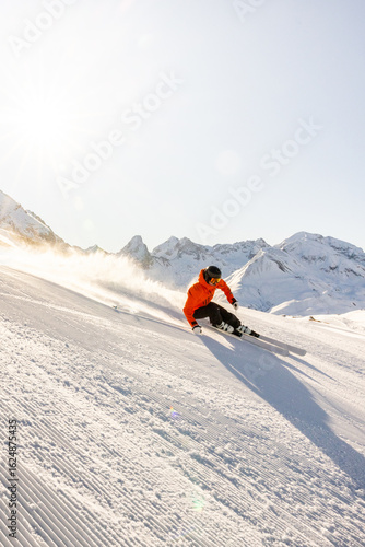 Skier Gliding on a Sunny Piste in Austria