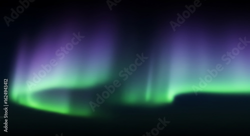 Mesmerizing Aurora Borealis Display with Green and Purple Hues on a Night Sky