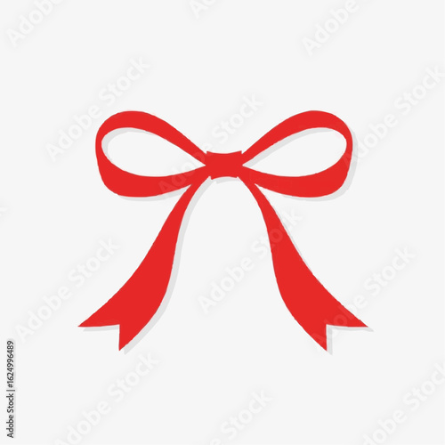 Red ribbon bow with tails on a neutral background  