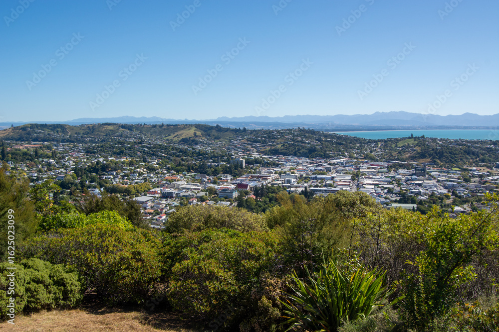 Fototapeta premium Scenic City View Surrounded by Nature