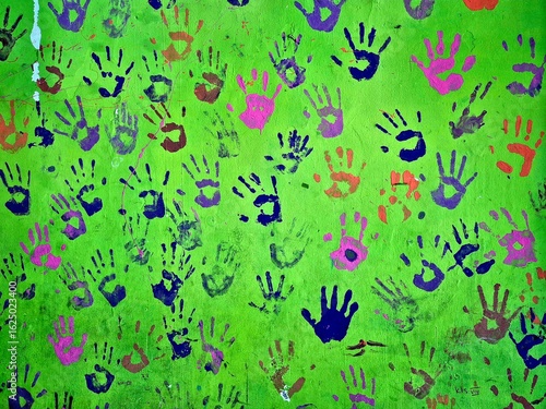 Wallpaper Mural Colorful Handprints on Green Wall

 Torontodigital.ca