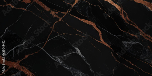 Luxurious marble texture with a predominantly black background and flowing patterns with golden veins running through it, creating a striking contrast.