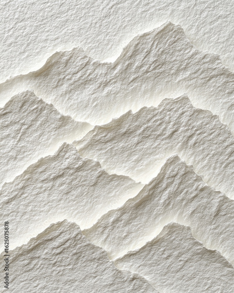 Obraz premium A close-up view of layered, sculpted paper mountains. The paper's texture is visible, with light and shadow highlighting the peaks and valleys. A subtle, almost ethereal quality is present