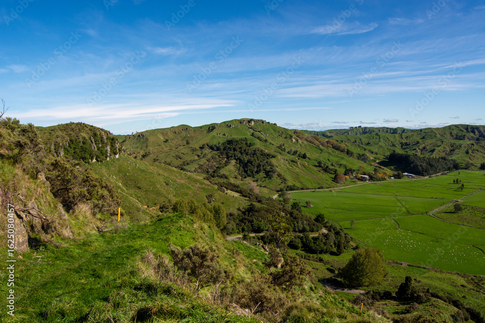 Lush Green Hills Under a Clear Blue Sky Lush Green Hills Under a Clear Blue Sky