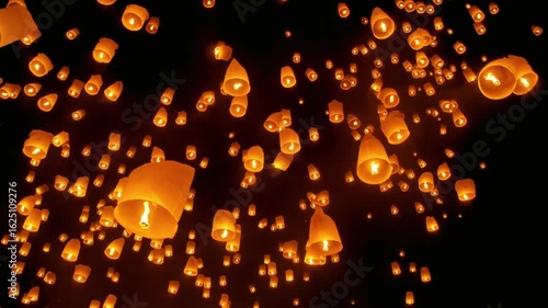 Many sky lanterns are released into the night sky during a festival