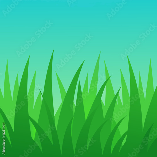 Vibrant green grass blades against a soft teal sky