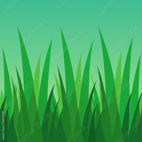 Vibrant green grass blades against a soft gradient sky