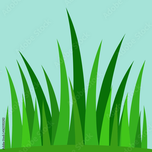 Vibrant green grass blades against a soft blue sky