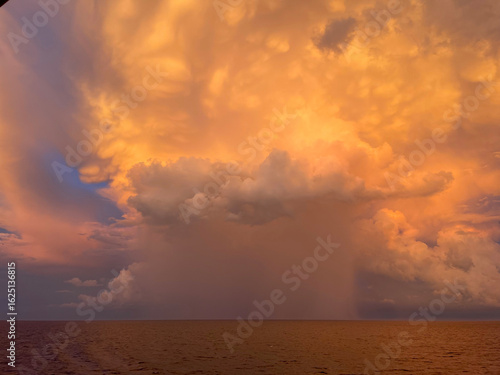 Fotografie Rainstorm out in the ocean
