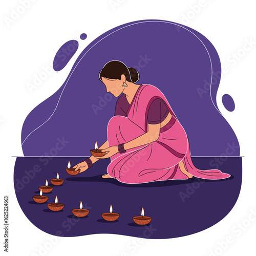 Woman lighting traditional oil lamps for a festival celebration