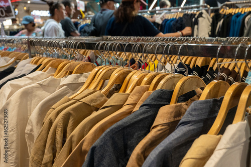 Wallpaper Mural clothes on hangers in a shop Torontodigital.ca