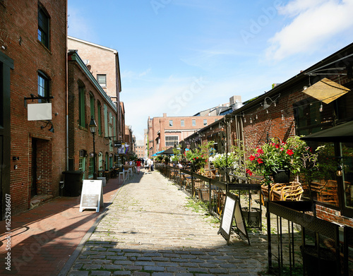Restaurants along historic Wharf St in downtown Portland Maine.