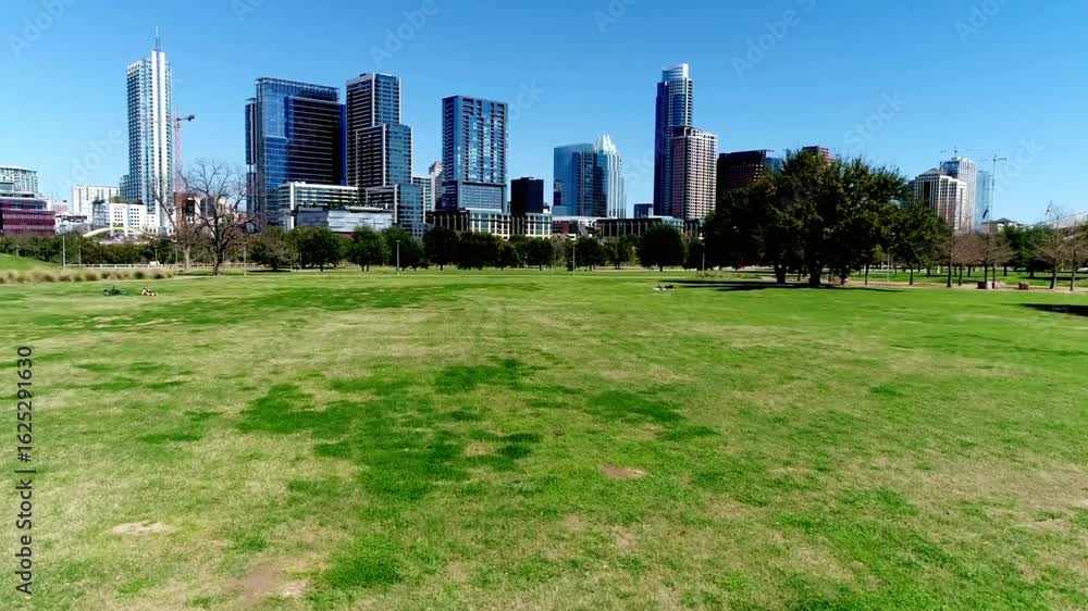 Skyline of the city of austin, texas, seen from a green meadow Skyline of the city of austin, texas, seen from a green meadow