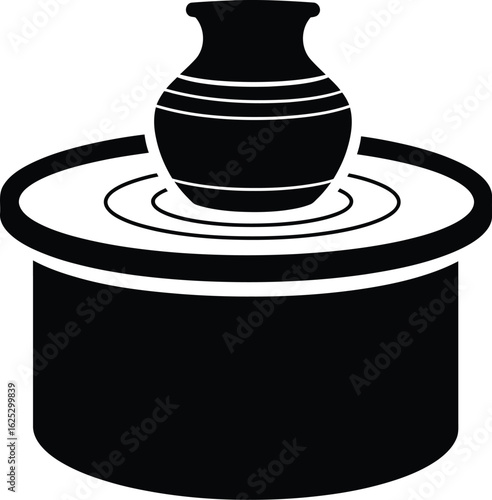 Solid black silhouette of a pottery wheel with a pot in progress, white background, flat vector