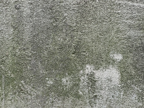 Close-up of concrete wall texture – gray rough surface background
