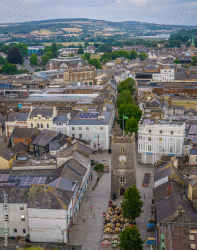 Wallpaper Mural Aerial view of Newton Abbot’s historic St Leonard’s Tower (Clock Tower) rising above town centre pedestrian streets and shops Torontodigital.ca