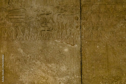 Egyptian ancient pictures on the stone wall