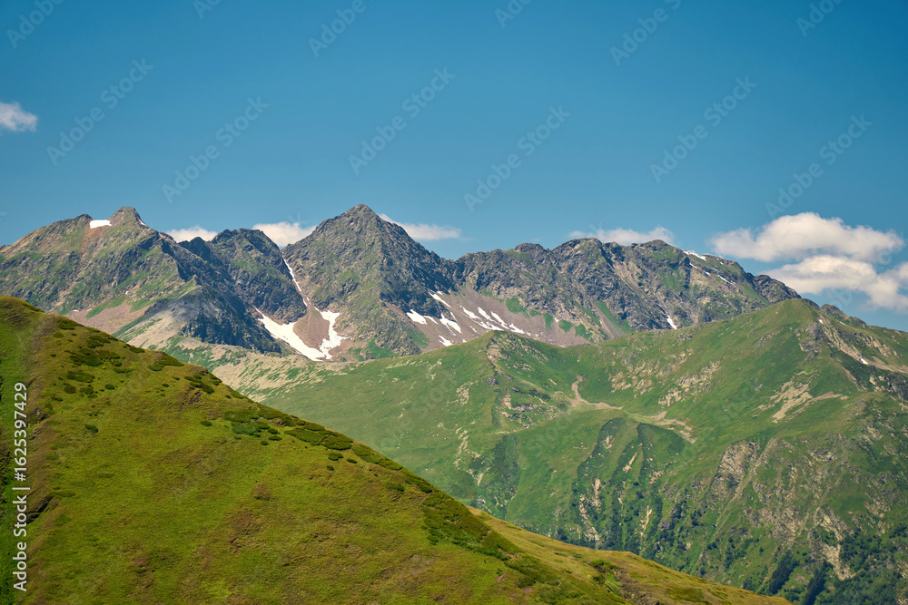 a beautiful view of the summer mountains, valleys, and waterfalls a beautiful view of the summer mountains, valleys, and waterfalls