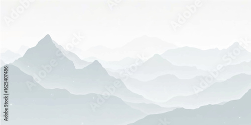 Misty mountain peaks at sunrise, with a serene forest valley below