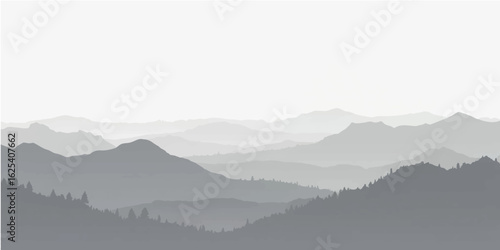 Foggy mountain landscape with clouds and misty hills