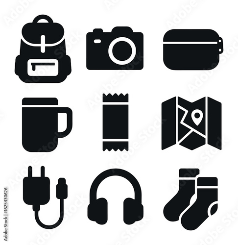 Weekend Getaway Essentials. olid, filled icons set of flat lay weekend getaway items: backpack, camera,