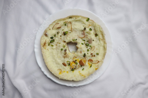 The perfect blend of crispy, sweet, and creamy ghewar