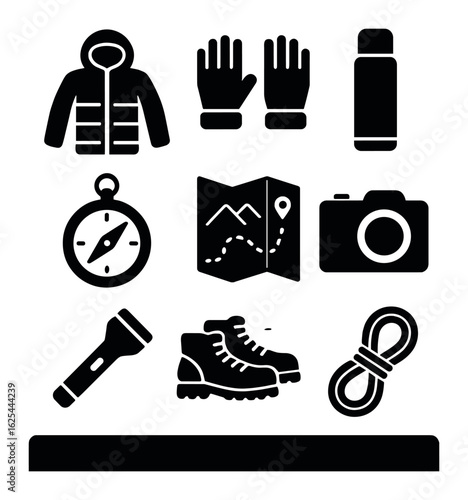 Mountain Trip Essentials. Solid, filled icons set of flat lay mountain trip items: jacket, gloves, thermal