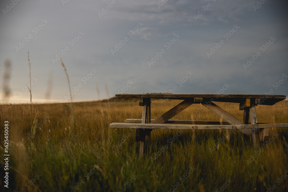 Fototapeta premium Picnic table at golden hour 