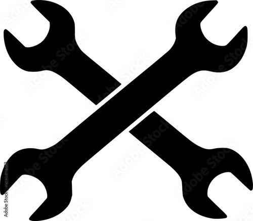Crossed wrenches symbolizing repair tools for mechanics and handymen in a workshop setting
