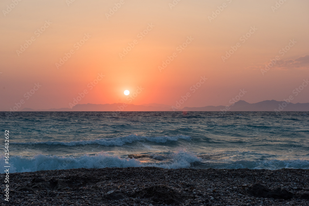 Obraz premium Aegean sea sunset beach sea Rhodes, Greece