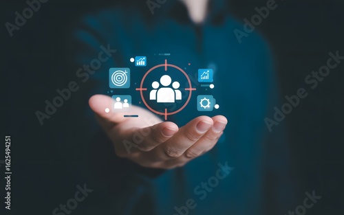 Customer Centricity: The focal point of customer service, where a person holds a glowing graphic of targeted people. Embracing a customer-focused ethos for success.