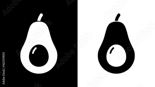 A halved avocado, its creamy flesh exposed, sits against a stark black and white background, symbolizing duality and simplicity.
