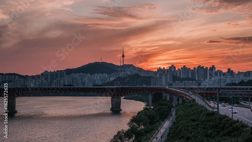 summer sunset 4k timelapse in summer Seoul, South Korea, Namsan Tower, Dongho Bridge, and Han River cityscape