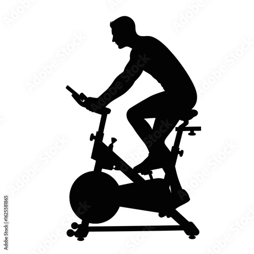 Silhouette of a man riding an exercise bike, pedaling and working out indoors.