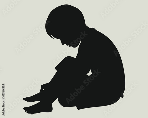 Silhouette of thoughtful child sitting alone, feeling sad or contemplative mood