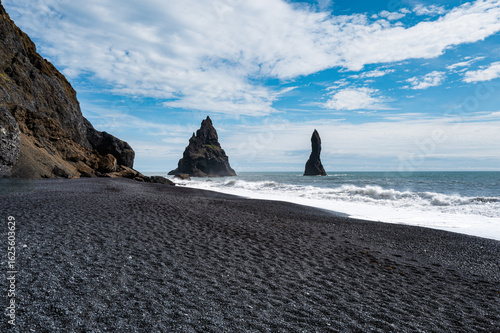 Dramatic Basalt Sea Stacks on Black Sand Beach in Iceland