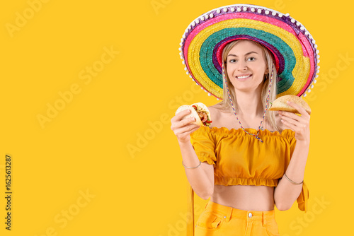 Young woman in sombrero hat...